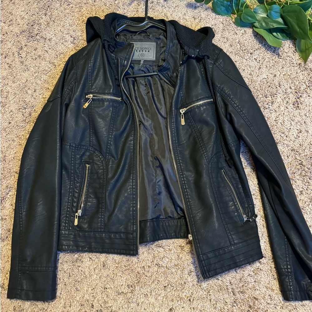 Black Ci Sono leather jacket with gold zipper and crochet hood